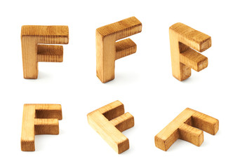 Set of six block wooden letters isolated