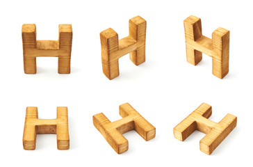 Set of six block wooden letters isolated