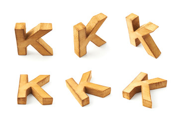 Set of six block wooden letters isolated