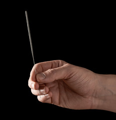Holding a new sparkler isolated
