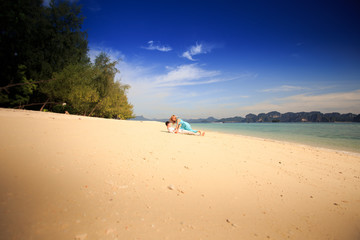 young happy asian couple on island