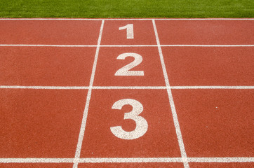 1 2 3 number on race track in football stadium.