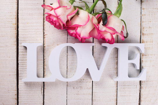 Postcard with elegant  flowers and word love