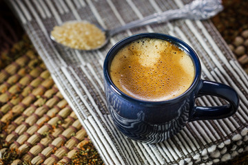 Blue cup of espresso coffee