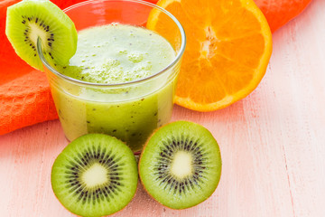 Healthy diet fruit juice kiwi orange wooden table