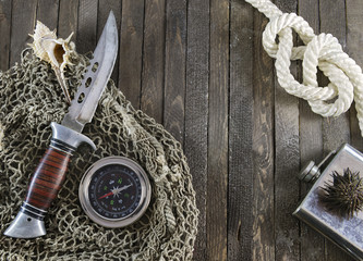 Fishing background with rope and knife