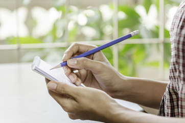 image of a woman writing