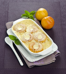 Gratin with yellow plums mirabelles