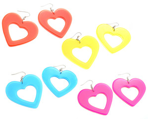 set of colourful plastic heart shaped earrings isolated on white - 78359995