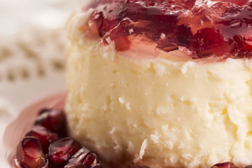 coconut panna cotta dessert with pomegranate