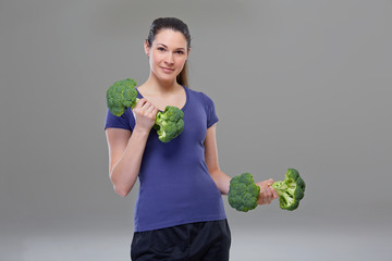 Exercise with broccoli dumbbell, symbol
