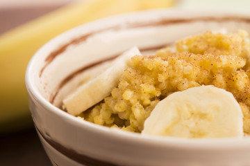 Fresh millet porridge with banana