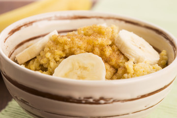 Fresh millet porridge with banana