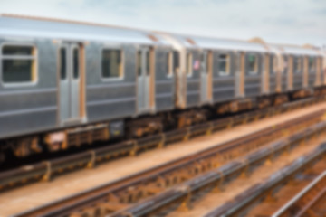 Fototapeta na wymiar Subway Train in New York before Sunset. Blurred Background.