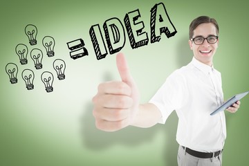 Geeky businessman holding his tablet