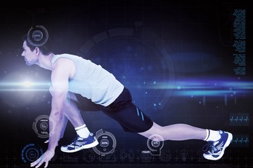 Young man in ready to run post