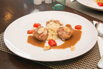 Mashed potatoes and beef steak