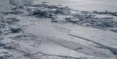 Frozen sea view on sunny day.