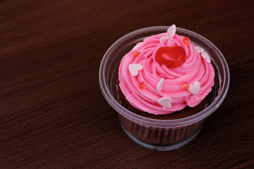 strawberry cake on wooden bg