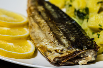 Fresh mackerel fillet with boiled potato and lemon