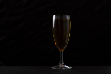 Glass is filled with alcohol