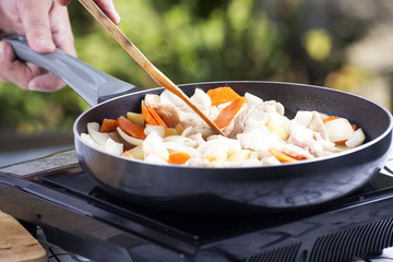 Chef cooking Japanes pork curry