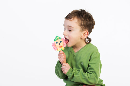 Kid Boy Eating Lollipop