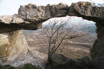 Ancient cave city in the rock in Crimea in autumn