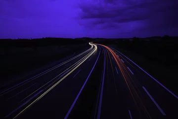 Acrylic prints Highway at night highway with light trails at nightfall