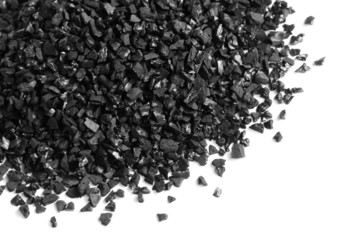 Granular activated carbon for water filter on white background