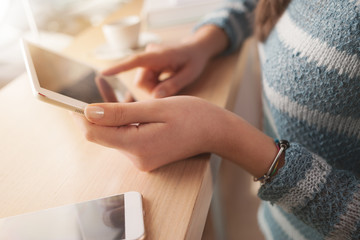 Woman using a touch screen tablet