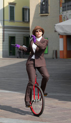 portrait of businesswoman with unicycle © alexandre zveiger
