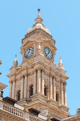 Fototapeta na wymiar Clock tower of City Hall in Cape Town, South Africa