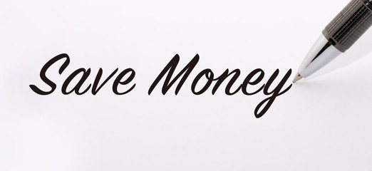 Obraz premium Pen write save money word on paper