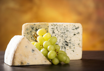 Blue cheese on wooden table