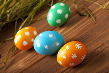 Easter eggs on wooden boards