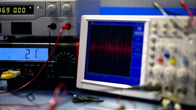 electronic components and oscilloscope in laboratory
