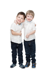 twins, one embraces another, isolated on the white