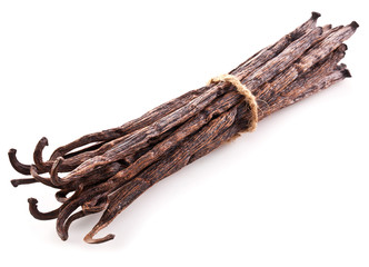 Bunch of vanilla sticks on white background.