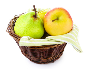 Assortment of juicy fruits in wicker basket, isolated on white
