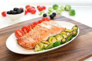 Piece of roasted salmon fillet with grilled vegetables