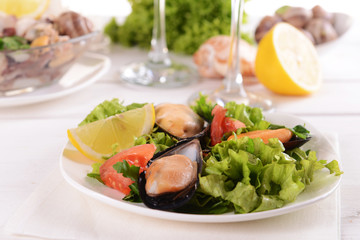 Tasty seafood on plate on table close-up