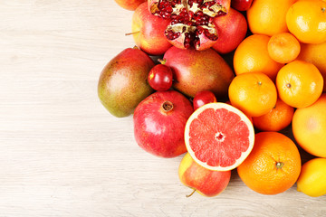 Assortment of exotic fruits on wooden table