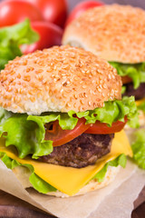 Sandwiches with cutlet, cheese and tomatoes