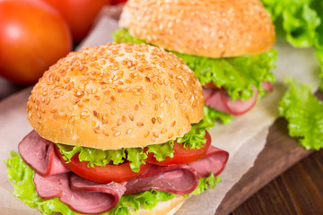 Sandwiches with ham and tomatoes