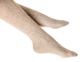 Female legs in knitted socks