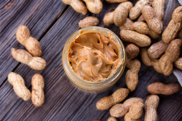 Fresh made creamy Peanut Butter in a glass jar