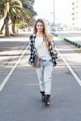 Obraz premium Beautiful Skateboarder