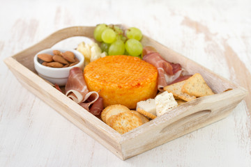 meat with cheese and fruits