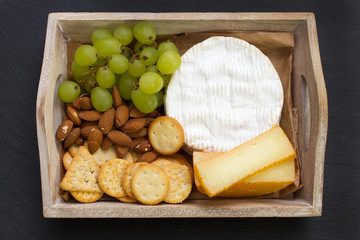 cheese with grape and cookies